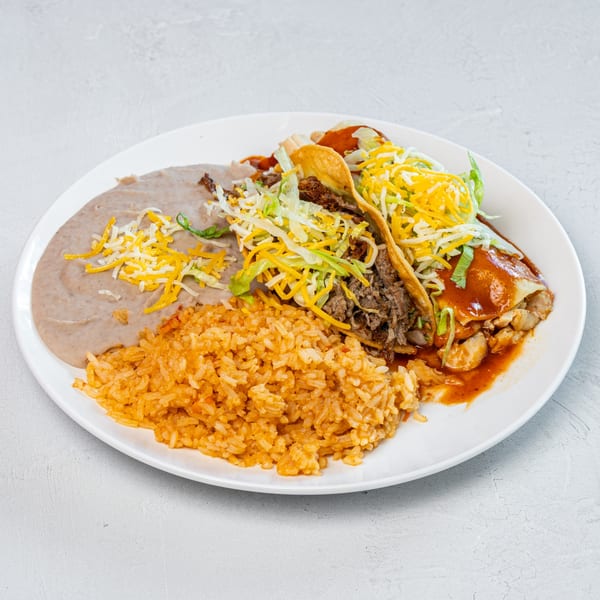 A Muchas Gracias Mexican Food combo plate with two tacos, a burrito, rice, and refried beans.